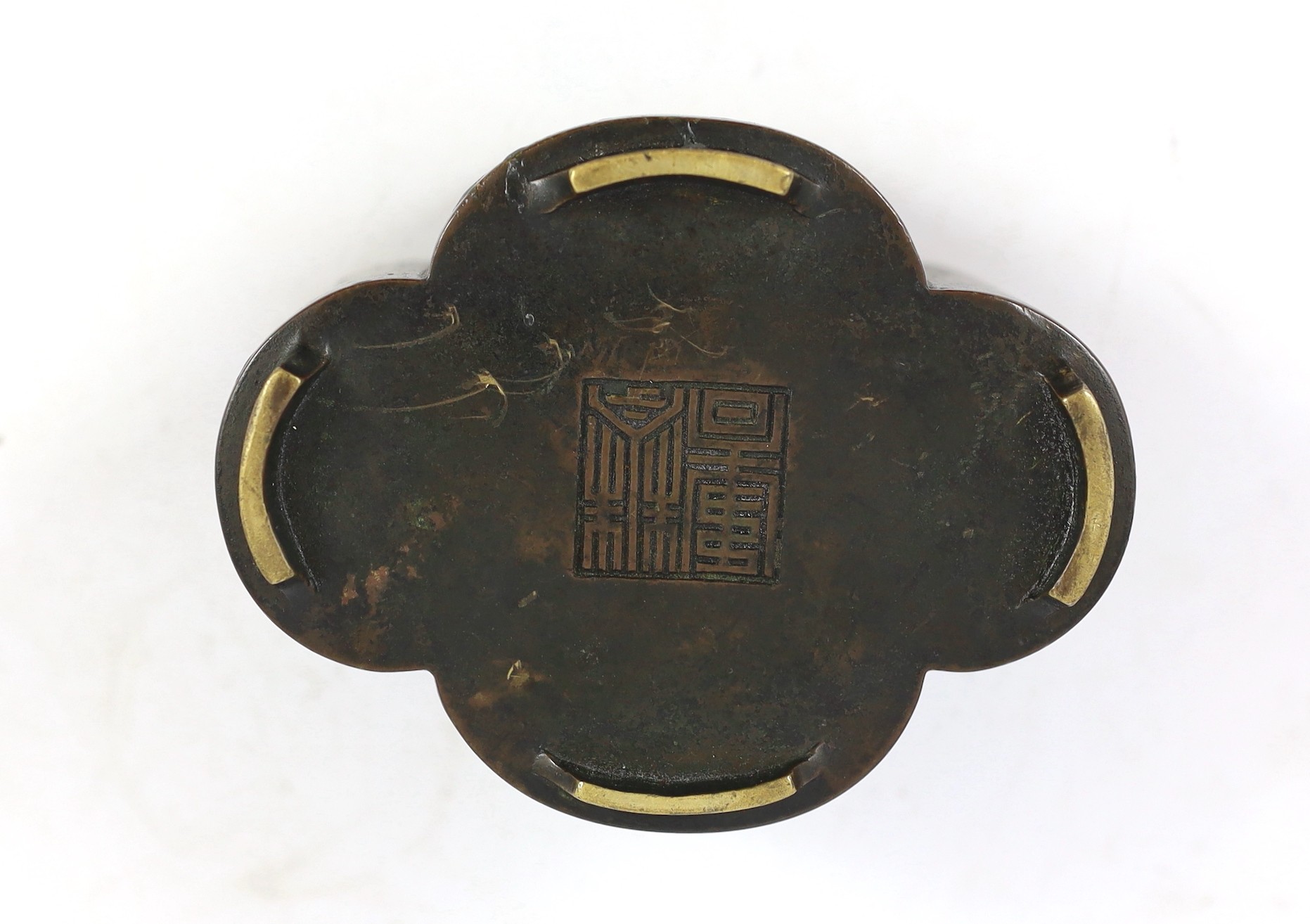 A Chinese quatrefoil shaped bronze censer, 17th/18th century, Qinxhu two character seal mark, 11.3cm wide